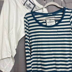 Poof Excellence size small set of two shirts